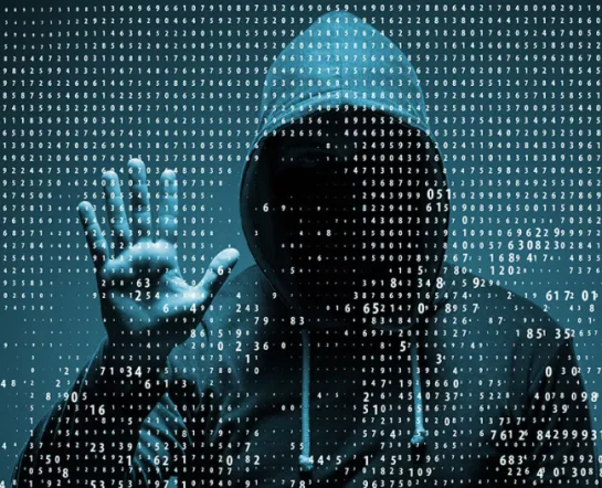 A hooded figure against a backdrop of binary code, symbolizing cybersecurity and hacking.